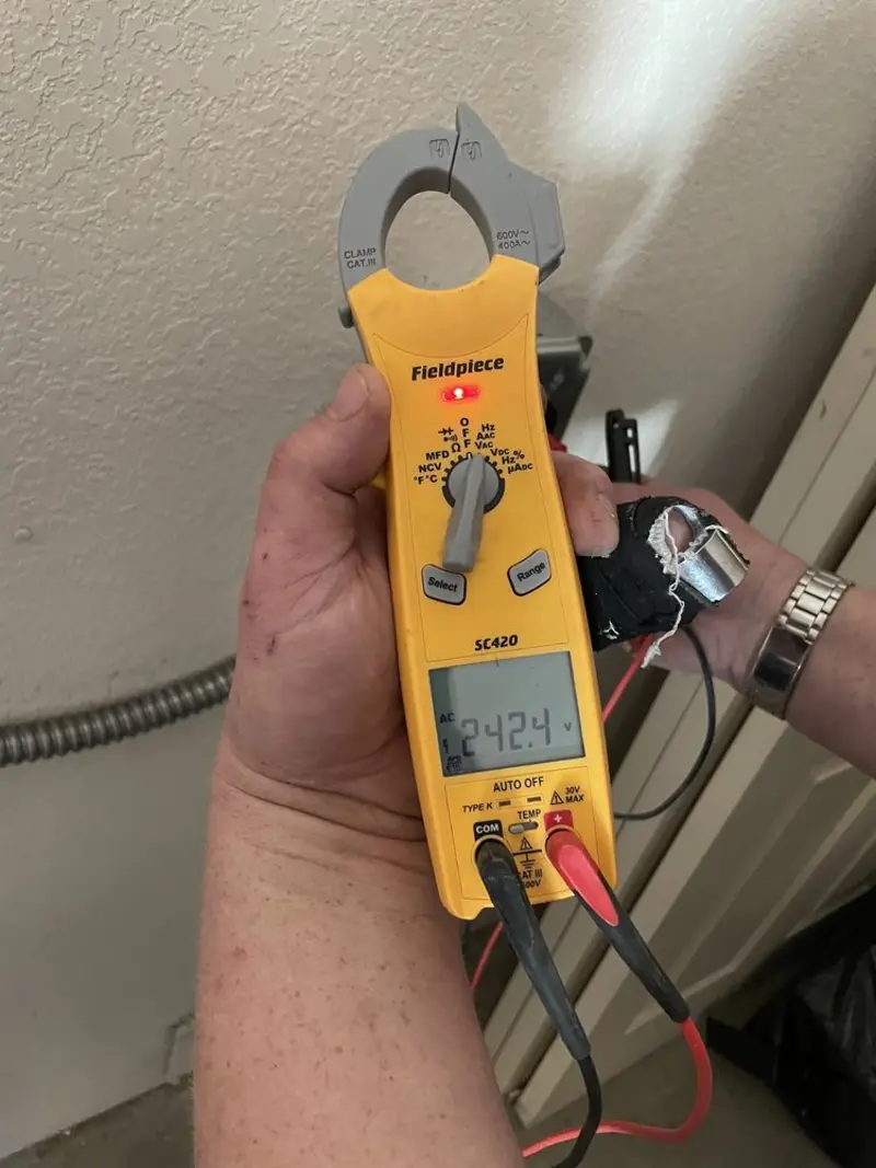 Voltage testing with clamp meter during Whole House Surge Protector in Fort Hunt